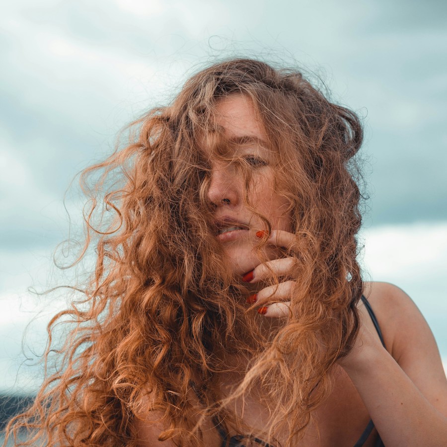 Woman with voluminous red curls
