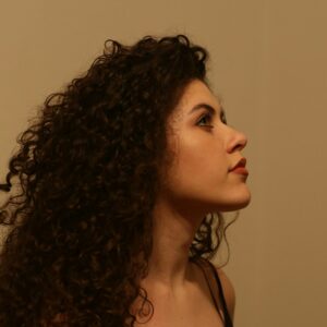 Woman with long curly hair