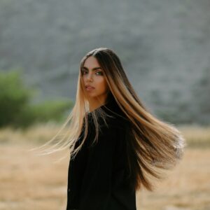 Woman with long natural waves