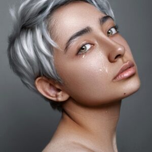 Woman with a platinum pixie cut